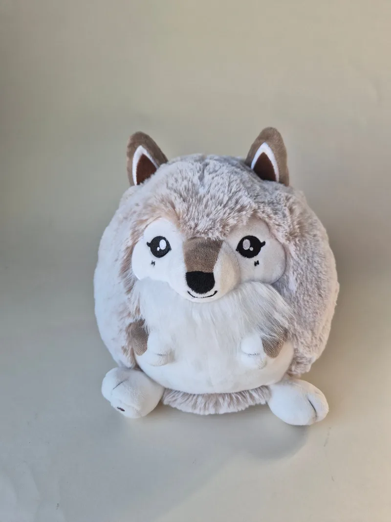 Front view of a large round taupe-and-cream Squishable wolf with mocha ears, big lashed embroidered eyes, and an ivory face and belly