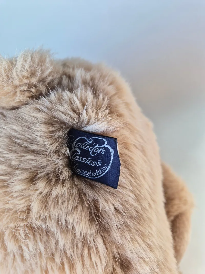 Close-up of the navy Collectors Classics limited edition woven ear tag